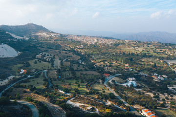 Fototapeta na wymiar Aerial view of Cyprus mountains and village, panoramic view of travel nature mediterranean landscape, drone shot.