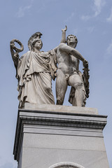 Sculpture from white Carrara marble at Palace Bridge (Schlossbrucke, built in 1824) is between Palace Square (Schlossplatz) and famous avenue Unter den Linden. Berlin, Germany.