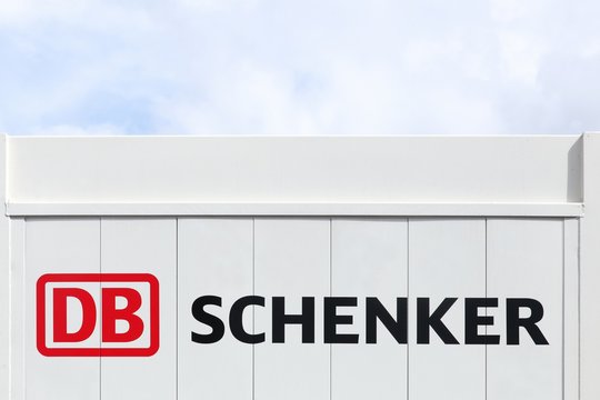 Billund, Denmark - May 14, 2016: DB Schenker logo on a wall. DB Schenker is a division of Deutsche Bahn that focuses on logistics