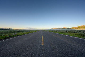 Fototapeta premium Low Angle of Road through Yellowstone Wilderness