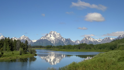 morning shot of the tetons at oxbow bend in wyoming