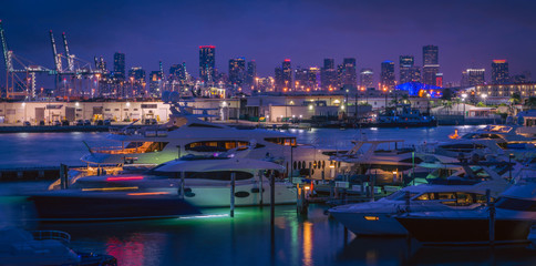 Fototapeta na wymiar night city building bay cityscape downtown panorama lighting boats dock miami