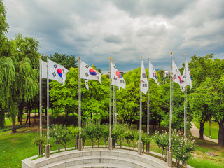 Fototapeta premium Many flags of South Korea on flagpoles
