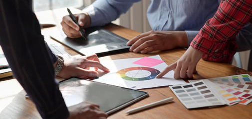 Cropped shot of young graphic designer discussing the project together