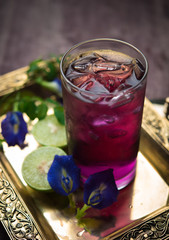 Butterfly pea juice with lime in cold glass, Anchan Thai flower