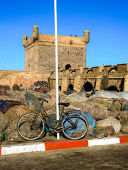 Bicycle, Fishing Nets, Ramparts in Essaouira Morocco