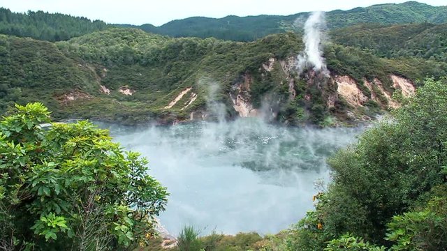 Hot steam flying on Frying pan lake at Waimangu Volcanic Valley, Rotorua at north island of New Zealand 