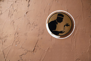 Sign of ablution room for washing parts of the body using water before formal prayer known as wudu...