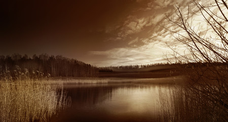 Fototapeta premium First ice on a body of water at the onset of winter