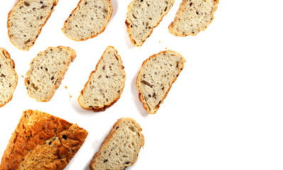 Sliced Kalamata olive bread isolated on white background, top view.