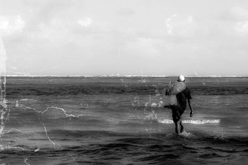 a fisherman going to the sea to cast a net