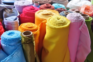 Colourful rolls of silk ready to be tailored