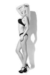 Slim woman in black underwear