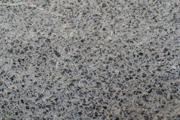 Photo of concrete wall with crack surface.
