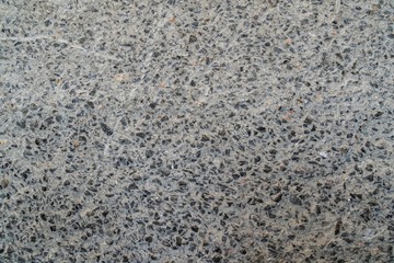 Photo of concrete wall with crack surface.