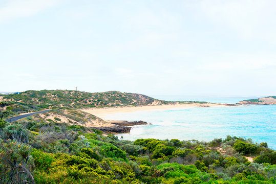 A view on Cape Martin Lighthouse and a beach from Bowman scenic drive, Beachport, South Australia