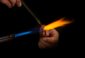 Men glassblower make handmade products