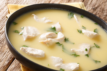 Chikhirtma is a flavorful and hearty Georgian soup that is believed to be a great hangover cure. It consists of chicken pieces, onions, eggs close-up. Horizontal