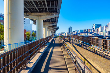 Japan. Tokyo. Transport infrastructure of Tokyo. Residential quarters of the Japanese capital. Bridge over the river and two-level roads. Streets Of Tokyo. Travel to East Asia. Transport in Japan.