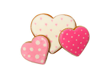 background from pink cookies heart shaped with different patterns, isolated on the white