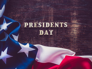 Presidents' Day. Beautiful greeting card. Brown, isolated background, close-up, view from above, wooden surface. Congratulations for relatives, friends and colleagues