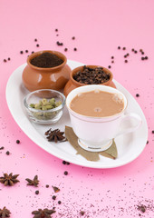 Indian Popular Drink Masala Chai or Masala Tea With Traditional Beverage on Pink Background