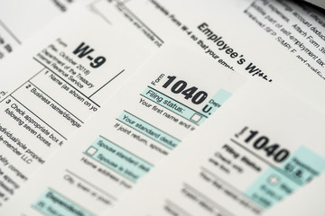 many 1040 tax form. Tax concept