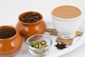Indian Popular Drink Masala Chai or Masala Tea With Toast on White Background