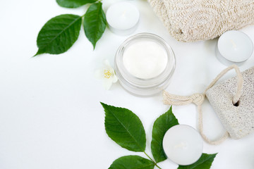 Obraz na płótnie Canvas Herbal cosmetic cream skincare product in glass jar on white background
