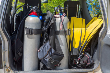 Diving equipment loaded in car trunk
