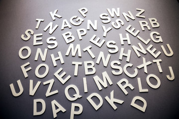Mixed letters pile closeup photo