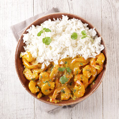 shrimp cooked with coconut cream and spice with rice