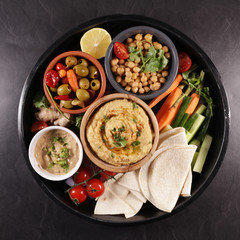 hummus, dipping sauce, olive and pita bread