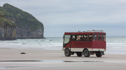 Farewell Spit New Zealand. Expedition bus. Tours beach coast