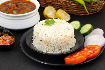 Rajma Chawal or Rajma Jeera Chawal (Rice) is a Traditional North Indian Food, Consisting of Cooked Red Kidney Beans in a Thick Gravy with Spices. Served with Jeera Rice