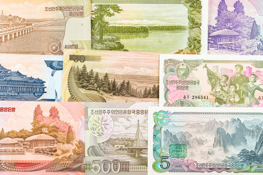 North Korea Won banknotes background. High resolution vintage photo of North Korean bill 4, DPRK money close up macro.