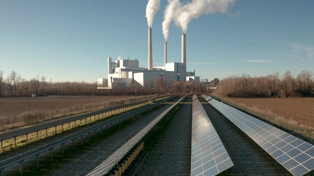 AS Heating Power Plant Munich North with solar cells in front of it