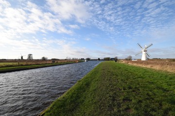 White windmill at Thurne, on the Norfolk Broads, England, UK.