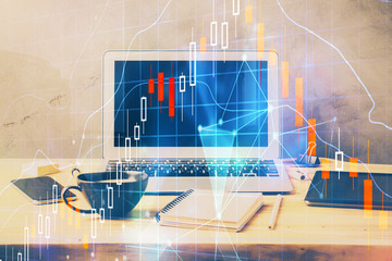 Multi exposure of chart and financial info and work space with computer background. Concept of...