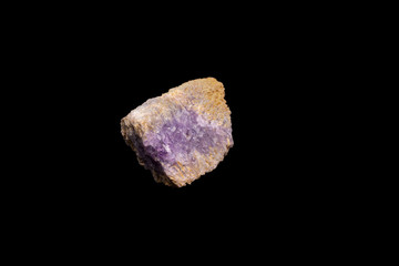 Purple rough Amethyst quartz crystals geode isolated on black