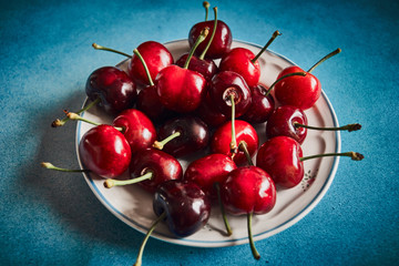 Fototapeta na wymiar strawberries with cherries very sweet