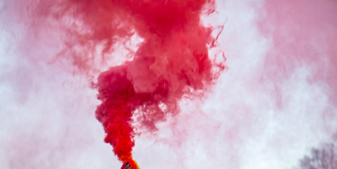 Colorful smoke from a smoke bomb.