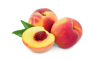 Ripe peach fruit and half with leaf isolated on white background