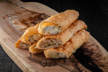 Homemade pies with cottage cheese, potatoes, or minced meat. Filled puff pastry