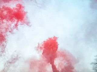 Colorful smoke from a smoke bomb.