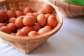 Eggs in a basket in natural light in the morning