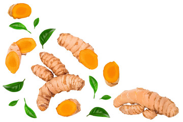 turmeric root and slices isolated on white background with copy space for your text. Top view. Flat...