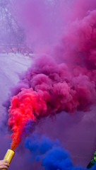 Colorful smoke from a smoke bomb.