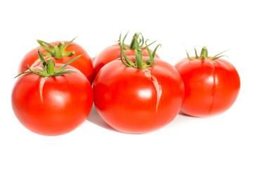 Group of red fresh tomatoes isolated on white background