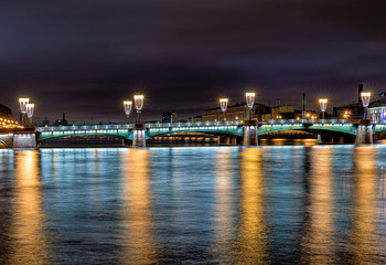 Fototapeta na wymiar Lights of the night city. Bridges of the night city